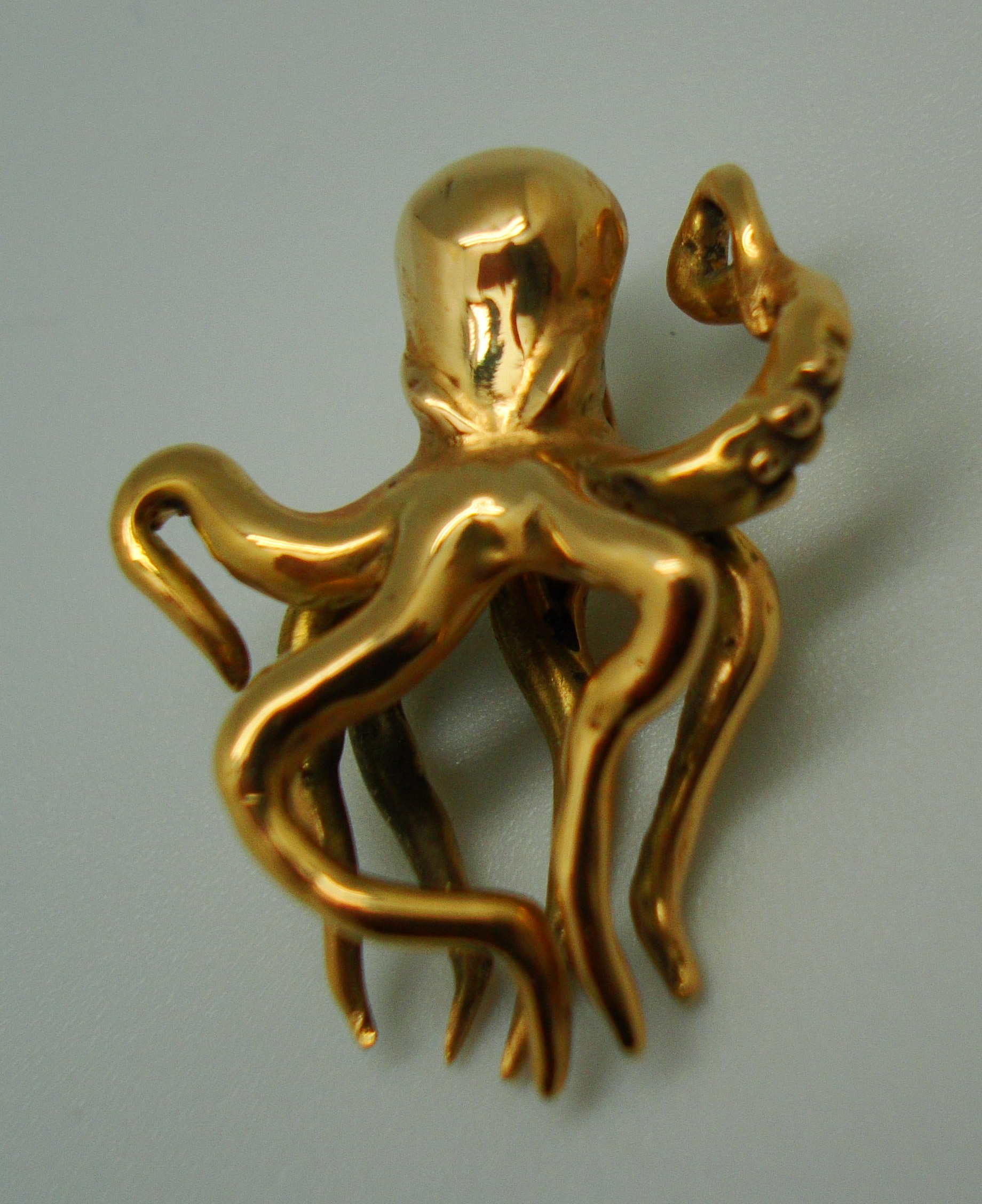 colgante pulpo oro